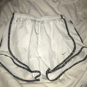 white nike running shorts